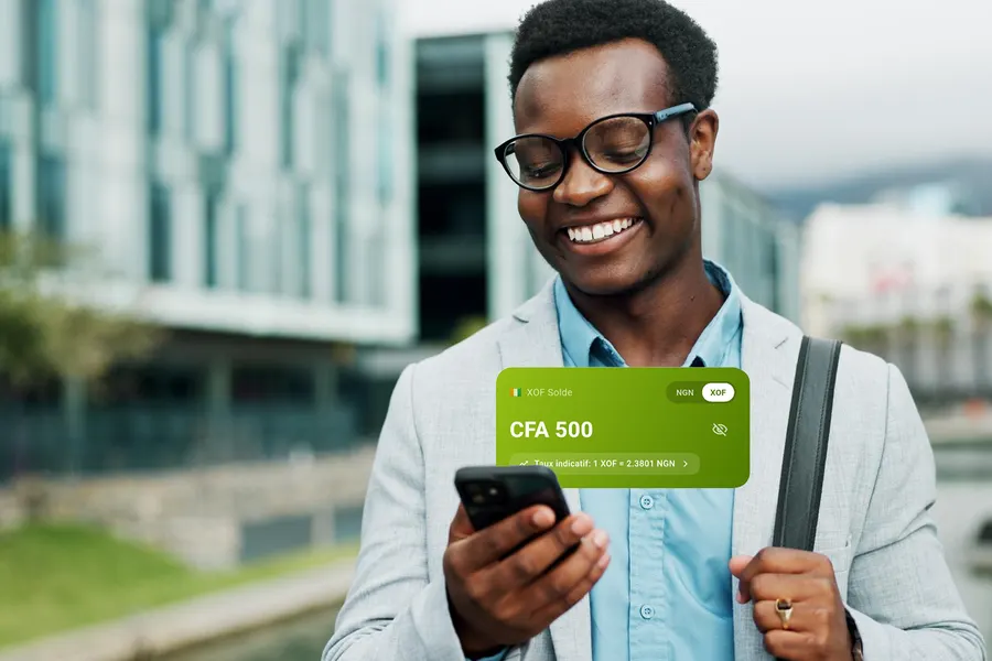 A student checking his XOF balance on his phone
